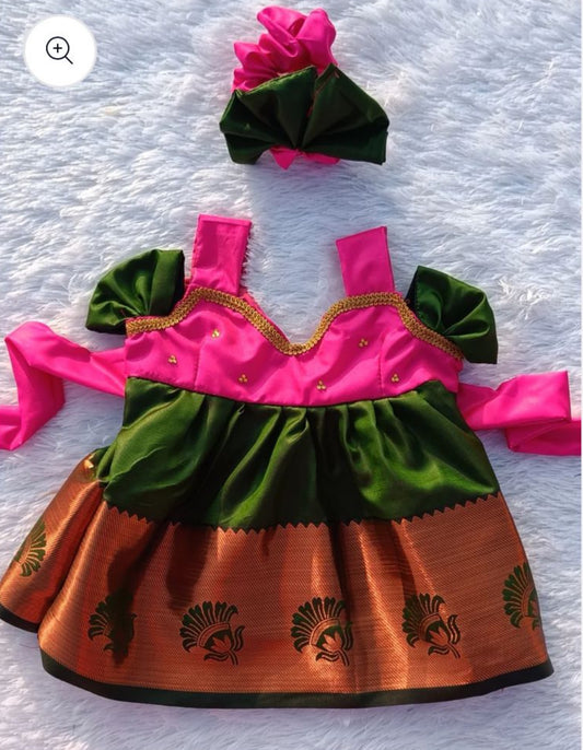 Emerald green and Hot Pink Frock with matching hair accessory.
